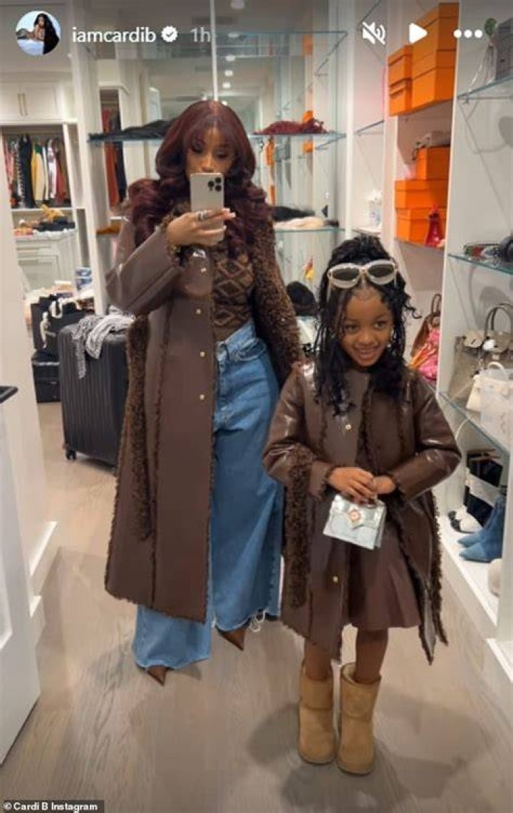 Mini-me: Her eldest daughter looked a spitting image of dad Peter as she enjoyed a day with her mom while wearing a playful polka dot dress